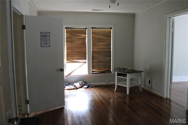 111 W Broadway St, Hayti, MO 63851 - office area featuring ornamental molding and wood finished floors