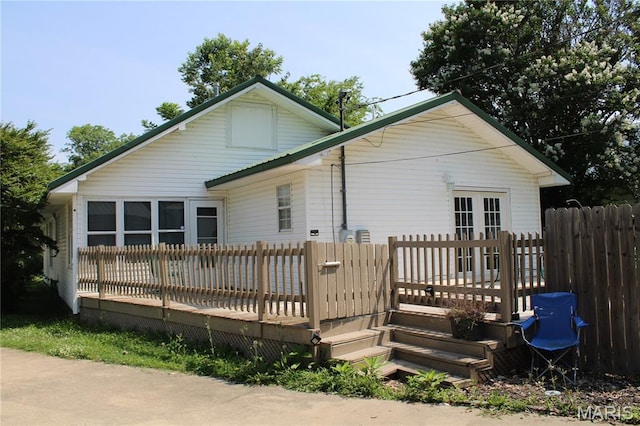 111 W Broadway St, Hayti, MO 63851 - back of property with a wooden deck