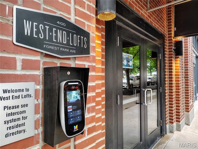 4100 Forest Park Ave Unit 322, Saint Louis, MO 63108 - property entrance featuring brick siding