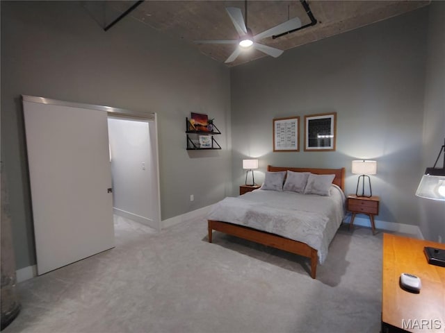 4100 Forest Park Ave Unit 322, Saint Louis, MO 63108 - carpeted bedroom with baseboards and a ceiling fan