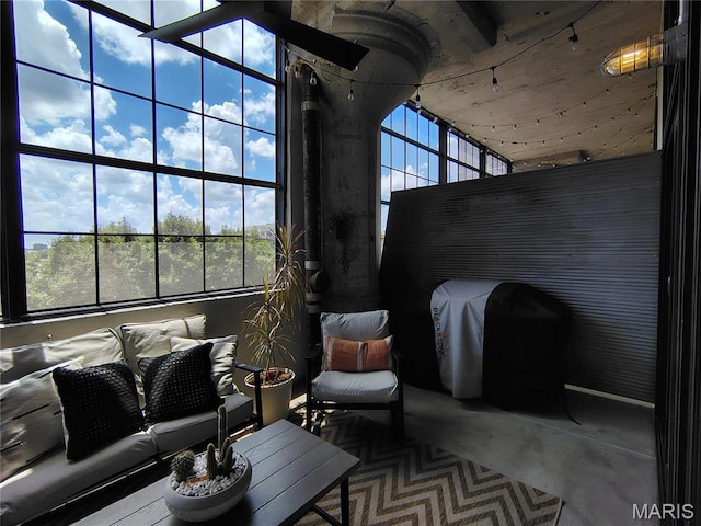 4100 Forest Park Ave Unit 322, Saint Louis, MO 63108 - living area with plenty of natural light and concrete flooring