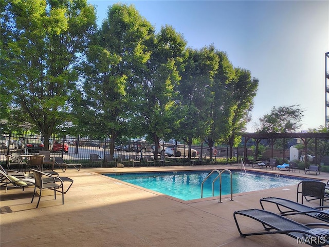 4100 Forest Park Ave Unit 322, Saint Louis, MO 63108 - community pool featuring a patio and a pergola