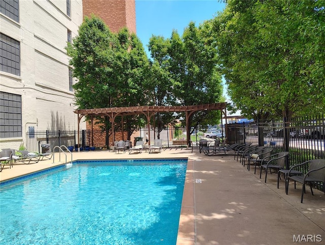 4100 Forest Park Ave Unit 322, Saint Louis, MO 63108 - community pool featuring a pergola and a patio area