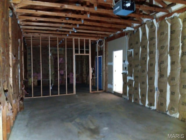 4664 Pogue Dr, House Springs, MO 63051 - garage featuring a garage door opener