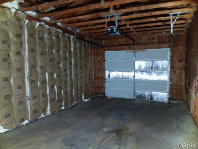 4664 Pogue Dr, House Springs, MO 63051 - garage featuring a garage door opener
