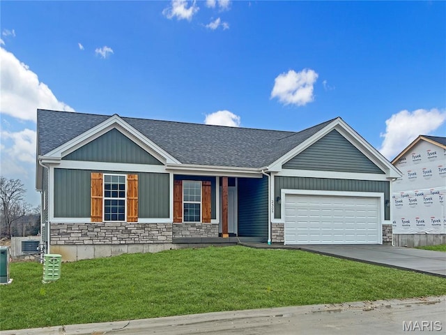50 Back Ct Unit 50Stb, Washington, MO 63090 - ranch-style home with stone siding, a garage, driveway, and a shingled roof