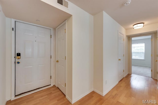 1125 Arbor Creek Dr Unit 2D, Saint Louis, MO 63122 - entrance foyer with light wood-type flooring and baseboards
