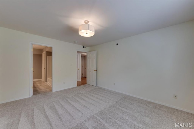 1125 Arbor Creek Dr Unit 2D, Saint Louis, MO 63122 - unfurnished bedroom featuring carpet flooring and baseboards