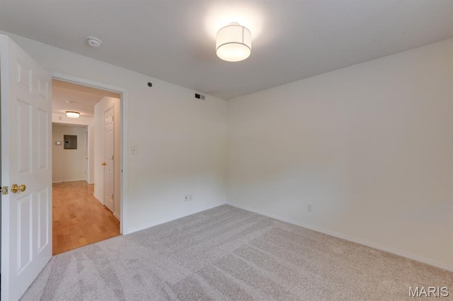 1125 Arbor Creek Dr Unit 2D, Saint Louis, MO 63122 - empty room featuring light carpet and a smoke detector