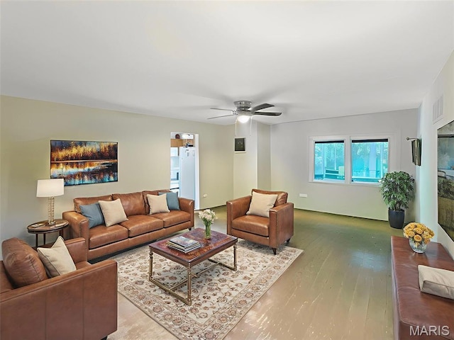 15468 Hitchcock Rd, Chesterfield, MO 63017 - living area featuring wood finished floors and ceiling fan