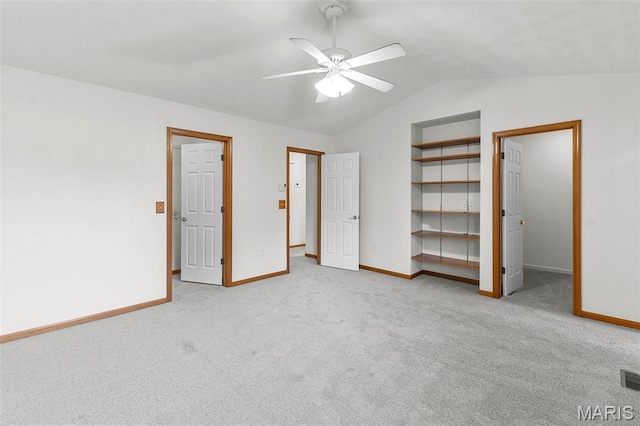 3779 Michael John Dr, Swansea, IL 62226 - unfurnished bedroom featuring vaulted ceiling, carpet floors, a walk in closet, and ceiling fan
