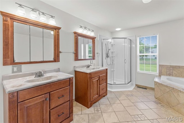 3779 Michael John Dr, Swansea, IL 62226 - full bath featuring a shower stall, two vanities, tile patterned floors, and a bath