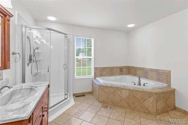 3779 Michael John Dr, Swansea, IL 62226 - bathroom featuring a shower stall, a garden tub, vanity, tile patterned floors, and recessed lighting