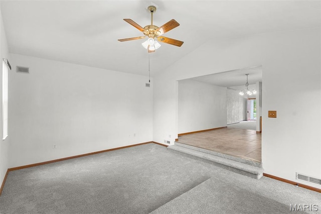 3779 Michael John Dr, Swansea, IL 62226 - carpeted spare room featuring vaulted ceiling, a ceiling fan, and a chandelier