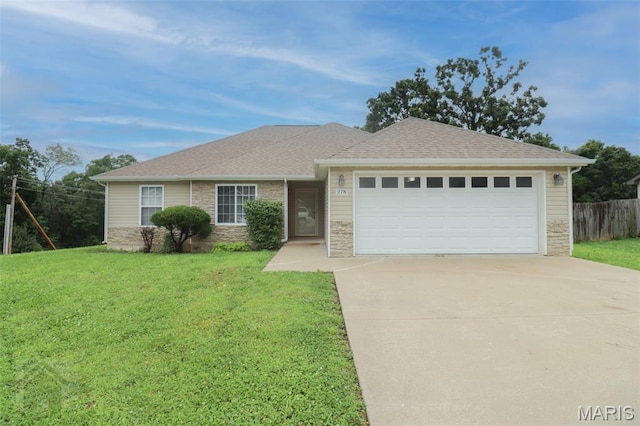 278 Settlers Pass, Waynesville, MO 65583 - ranch-style home with driveway, an attached garage, and stone siding