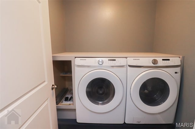 278 Settlers Pass, Waynesville, MO 65583 - washroom with washing machine and clothes dryer