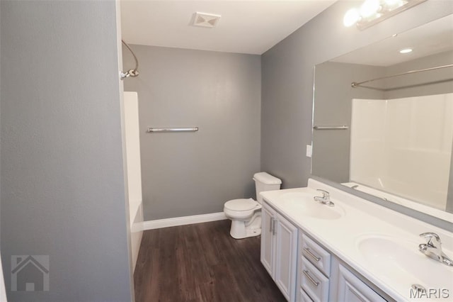 278 Settlers Pass, Waynesville, MO 65583 - full bath featuring shower / bathtub combination, double vanity, and wood finished floors