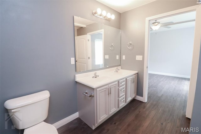 278 Settlers Pass, Waynesville, MO 65583 - bathroom featuring wood finished floors, double vanity, and ceiling fan