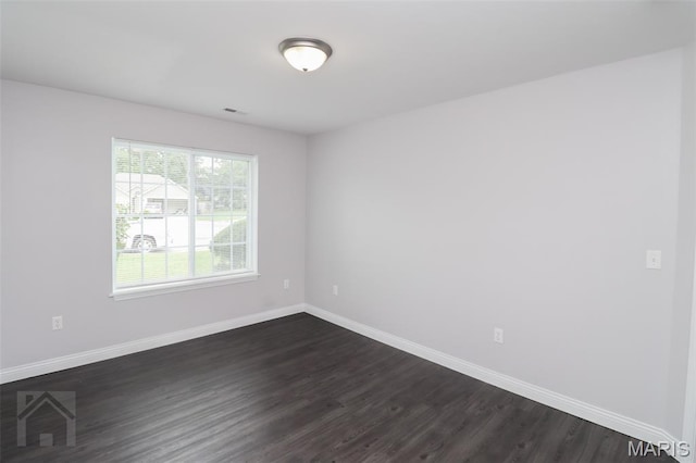 278 Settlers Pass, Waynesville, MO 65583 - unfurnished room featuring dark wood-style flooring and baseboards