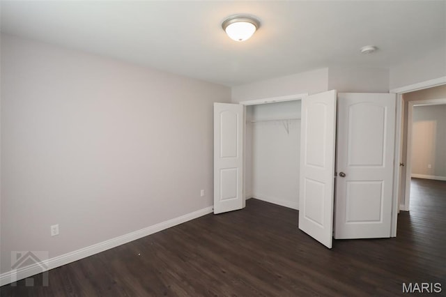 278 Settlers Pass, Waynesville, MO 65583 - unfurnished bedroom featuring dark wood-style floors and a closet