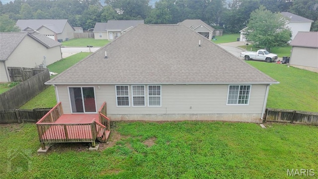 278 Settlers Pass, Waynesville, MO 65583 - back of property with a deck, a fenced backyard, and a shingled roof