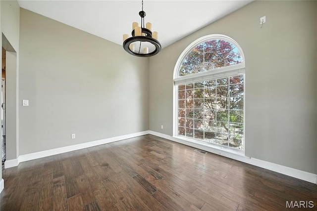 1408 Elm Tree Rd, Troy, MO 63379 - unfurnished dining area featuring a chandelier and dark wood finished floors