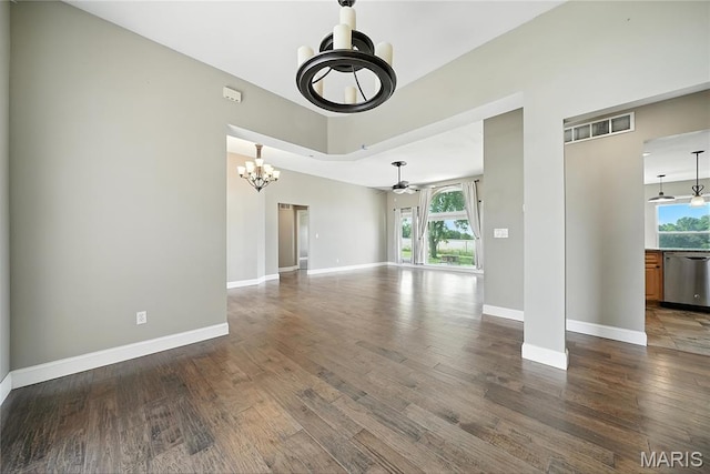1408 Elm Tree Rd, Troy, MO 63379 - unfurnished living room with a chandelier, healthy amount of natural light, wood finished floors, and a ceiling fan