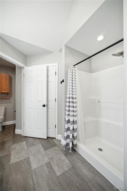 1408 Elm Tree Rd, Troy, MO 63379 - bathroom featuring toilet and a shower stall