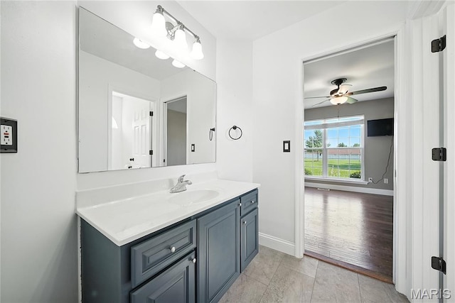 1408 Elm Tree Rd, Troy, MO 63379 - bathroom with vanity, a ceiling fan, and tile patterned flooring