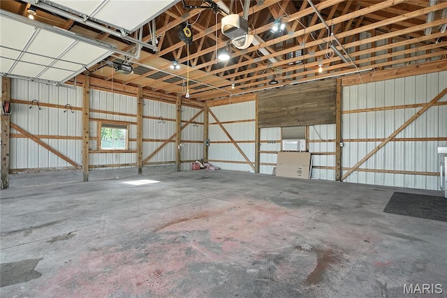 1408 Elm Tree Rd, Troy, MO 63379 - garage with a garage door opener and metal wall