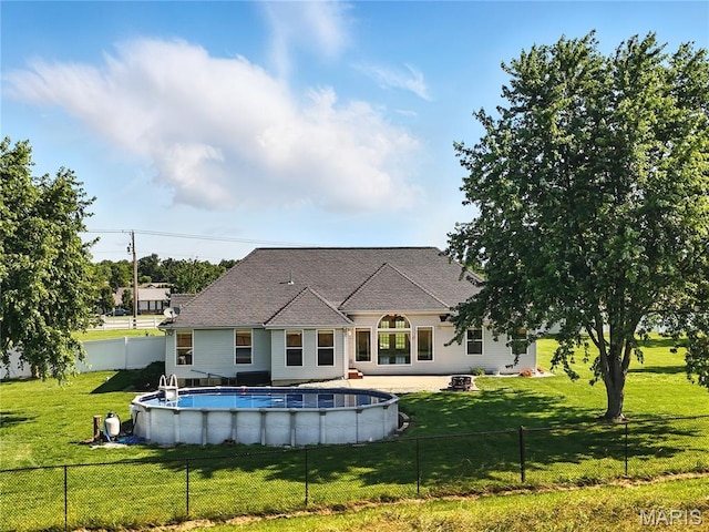 1408 Elm Tree Rd, Troy, MO 63379 - back of house with an outdoor pool and a fenced backyard