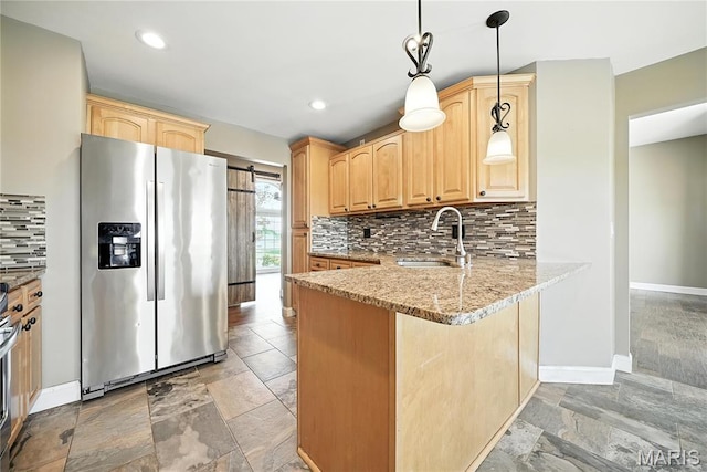 1408 Elm Tree Rd, Troy, MO 63379 - kitchen with stainless steel appliances, light brown cabinets, stone tile flooring, and recessed lighting