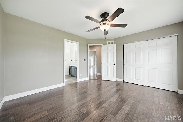1408 Elm Tree Rd, Troy, MO 63379 - unfurnished bedroom featuring wood finished floors, a closet, and a ceiling fan