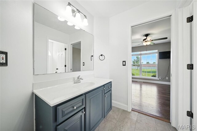 1408 Elm Tree Rd, Troy, MO 63379 - bathroom with vanity, a ceiling fan, and tile patterned flooring