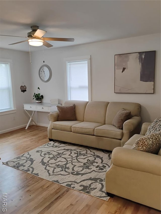 131 Sackett St, Licking, MO 65542 - living room featuring wood finished floors and a ceiling fan