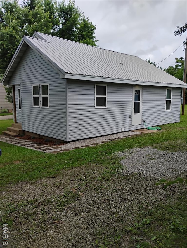 131 Sackett St, Licking, MO 65542 - back of house featuring a metal roof