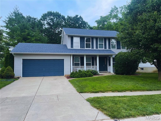 1804 Willow Oak Dr, Saint Charles, MO 63303 - view of front of property with covered porch, an attached garage, a front yard, driveway, and roof with shingles