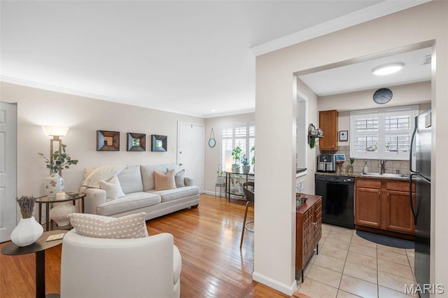 946 Marshall Ave Unit A, Webster Groves, MO 63119 - living area featuring ornamental molding and light wood-type flooring