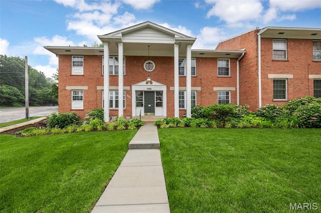 946 Marshall Ave Unit A, Webster Groves, MO 63119 - view of front of home with a front lawn and brick siding