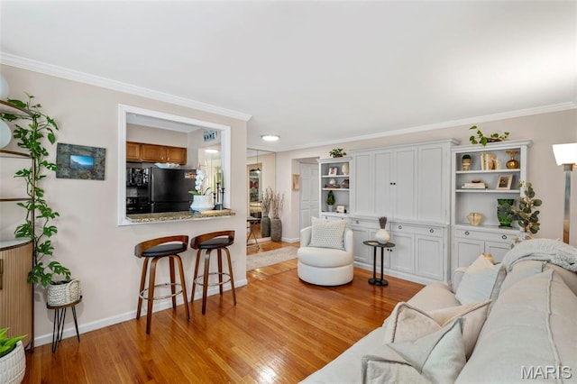 946 Marshall Ave Unit A, Webster Groves, MO 63119 - living room with light wood-type flooring and crown molding