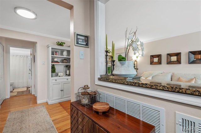 946 Marshall Ave Unit A, Webster Groves, MO 63119 - corridor featuring light wood-type flooring and crown molding