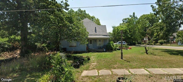 402 N Chestnut St, Richland, MO 65556 - view of front of property with a front lawn