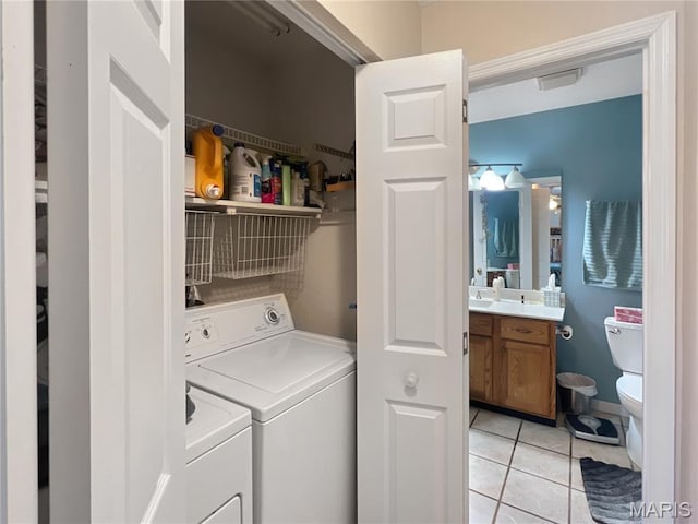 3 Crabapple Ln, Glen Carbon, IL 62034 - laundry room featuring separate washer and dryer and light tile patterned floors