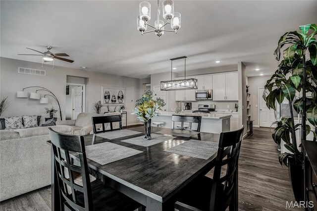 191 Noahs Mill Dr, Lake St Louis, MO 63367 - dining room featuring a chandelier, dark wood finished floors, ceiling fan, and recessed lighting