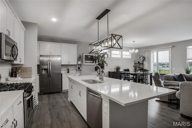191 Noahs Mill Dr, Lake St Louis, MO 63367 - kitchen featuring stainless steel appliances, light countertops, dark wood-type flooring, white cabinets, and recessed lighting