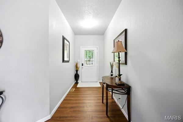 5 Sherman Ct, Hillsboro, MO 63050 - doorway to outside with dark wood-type flooring and baseboards