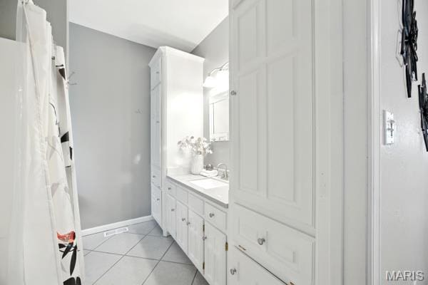 5 Sherman Ct, Hillsboro, MO 63050 - full bathroom featuring vanity and tile patterned flooring