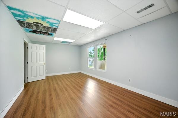 5 Sherman Ct, Hillsboro, MO 63050 - empty room featuring a drop ceiling and wood finished floors