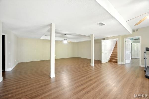 5 Sherman Ct, Hillsboro, MO 63050 - finished basement with ceiling fan, wood finished floors, and stairs