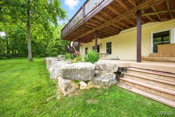 5 Sherman Ct, Hillsboro, MO 63050 - view of green lawn with stairway and a deck
